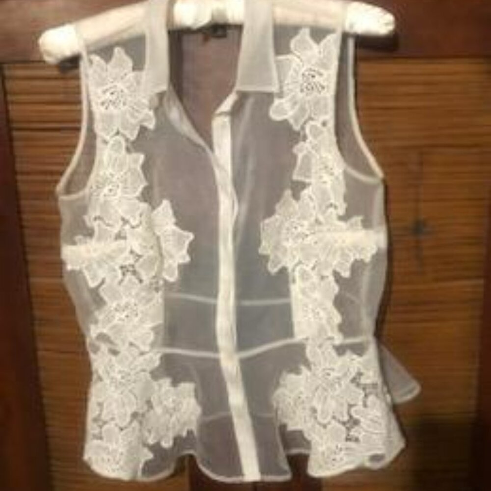 White Embroidered Sleeveless Blouse